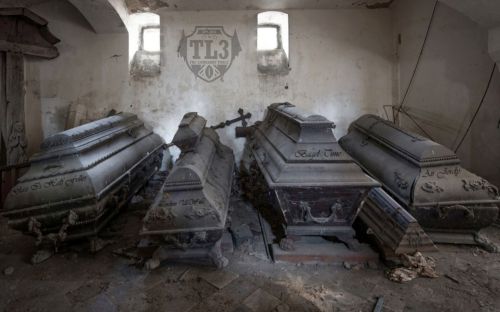 Coffins are etched with previous year's trophy winners. 